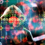 faceless hacker using binary to encrypt data