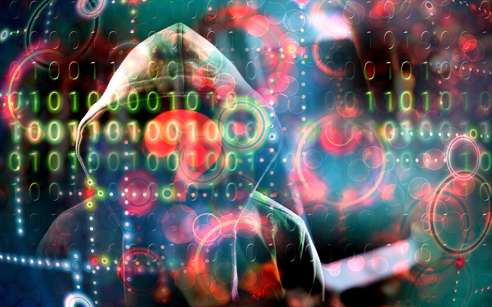 faceless hacker using binary to encrypt data