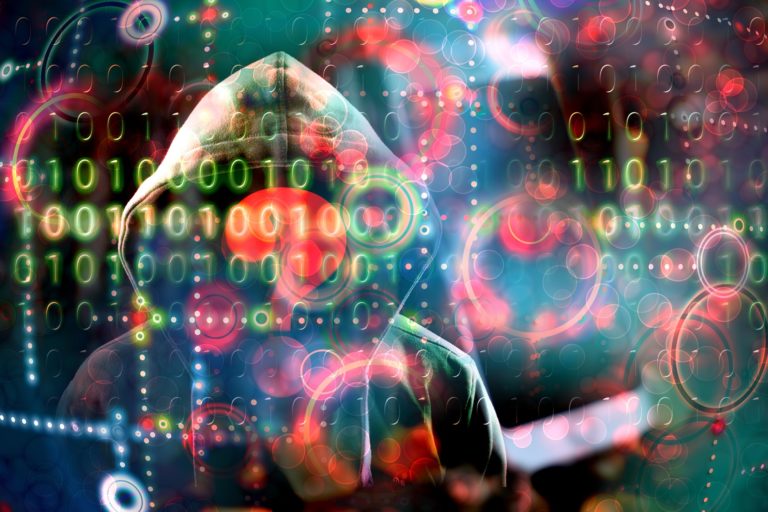faceless hacker using binary to encrypt data