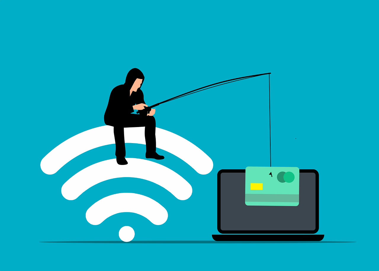 main dressed in all black sitting on a wifi symbol phishing for credit card on a laptop