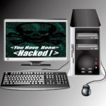 Computer with monitor and the monitor says "You have been hacked!"