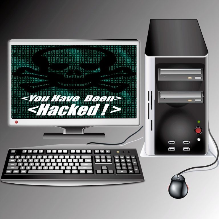 Computer with monitor and the monitor says "You have been hacked!"