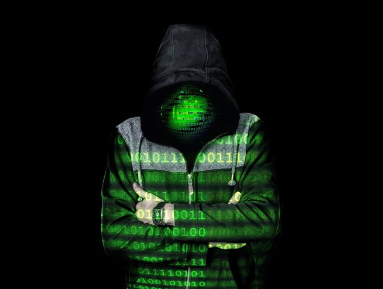 Hacker with code written across him