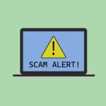 Laptop screen with "Scam Alert!" warning
