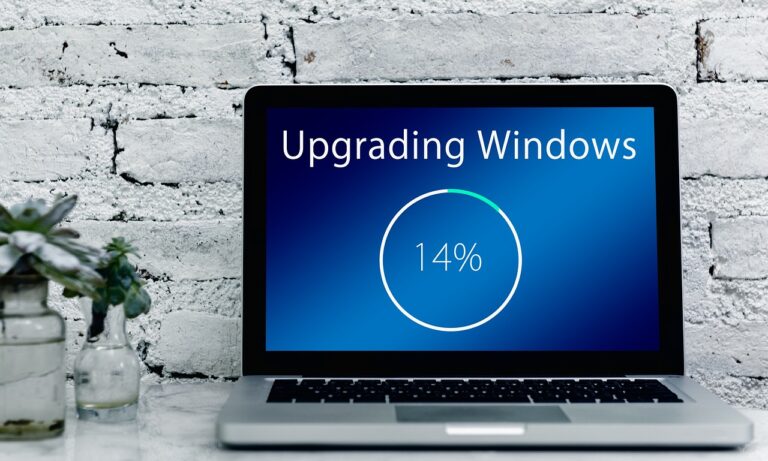 Laptop showing Windows is being upgraded