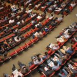 Conference attendees in auditorium