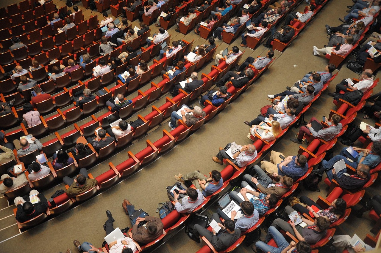 Conference attendees in auditorium