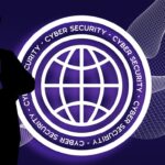 shadow of a man in front of a cybersecurity emblem