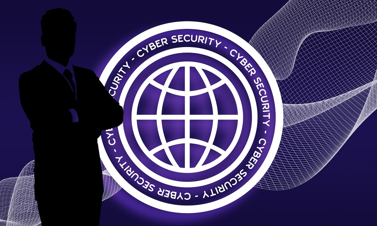 shadow of a man in front of a cybersecurity emblem
